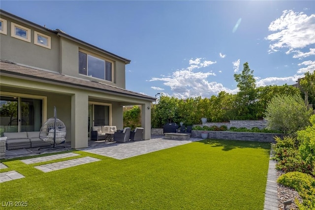 12426 Alpenglow Ct, Las Vegas, NV 89138 - view of green lawn featuring outdoor lounge area and a patio area
