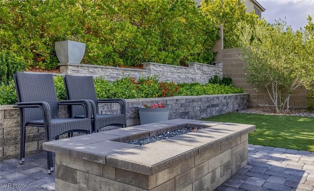 12426 Alpenglow Ct, Las Vegas, NV 89138 - view of patio featuring an outdoor fire pit