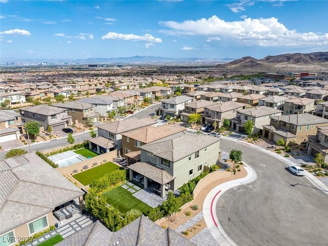 12426 Alpenglow Ct, Las Vegas, NV 89138 - aerial view of residential area featuring a mountainous background