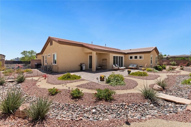 4317 Velvet Ridge Ct, Las Vegas, NV 89129 - back of house featuring a patio and stucco siding