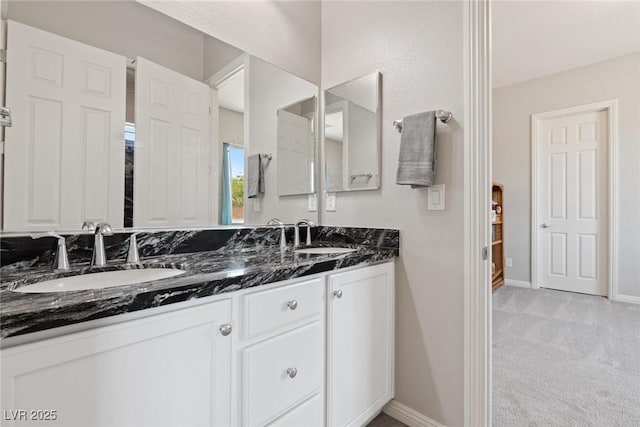 4317 Velvet Ridge Ct, Las Vegas, NV 89129 - full bathroom featuring double vanity and baseboards