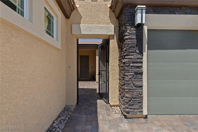 4317 Velvet Ridge Ct, Las Vegas, NV 89129 - view of exterior entry featuring stucco siding and stone siding