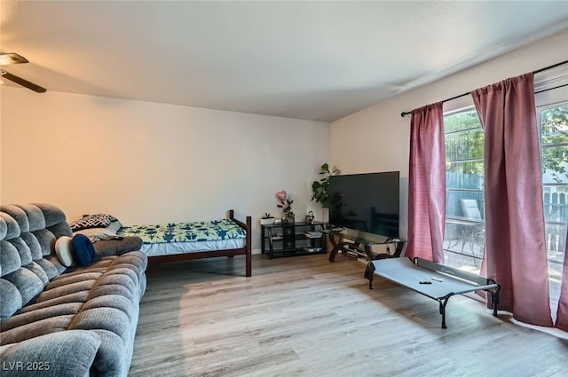 4259 Kona Coast Way, Las Vegas, NV 89121 - living area featuring wood finished floors and ceiling fan