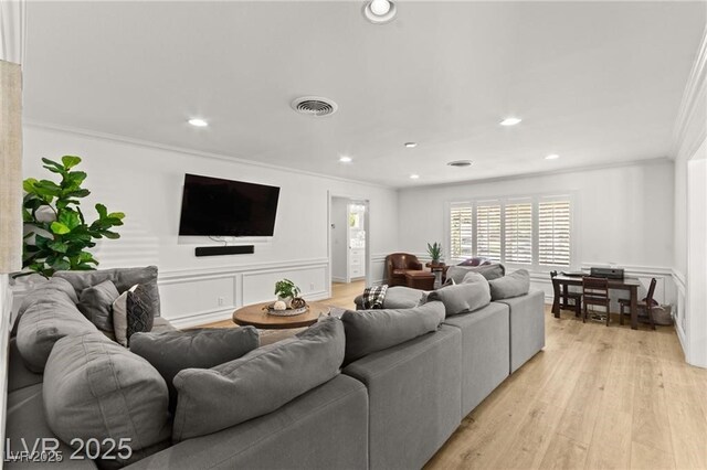 3108 Sonia Dr, Las Vegas, NV 89107 - living room with ornamental molding, recessed lighting, and light wood finished floors
