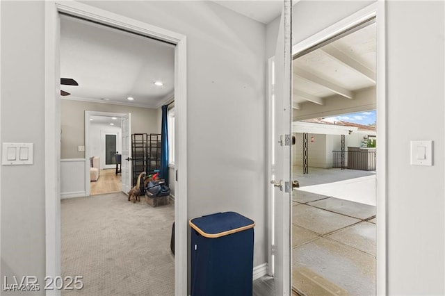 3108 Sonia Dr, Las Vegas, NV 89107 - hallway featuring carpet floors, crown molding, and a wainscoted wall