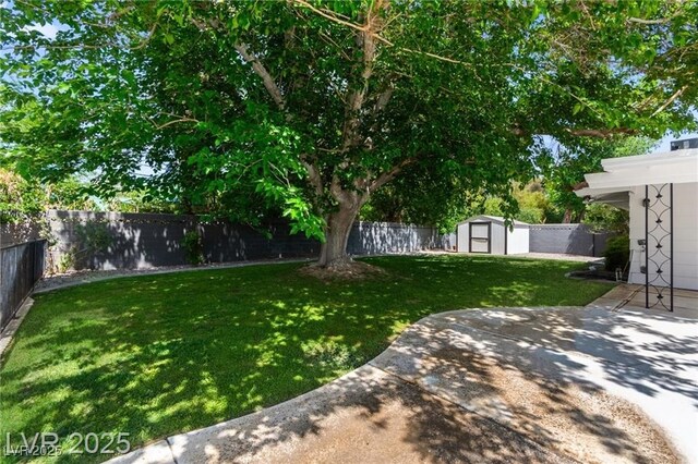 3108 Sonia Dr, Las Vegas, NV 89107 - fenced backyard with a storage shed and a patio