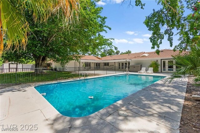 3108 Sonia Dr, Las Vegas, NV 89107 - view of swimming pool featuring french doors and a patio
