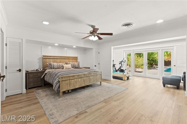 3108 Sonia Dr, Las Vegas, NV 89107 - bedroom featuring access to outside, light wood-style floors, french doors, crown molding, and recessed lighting