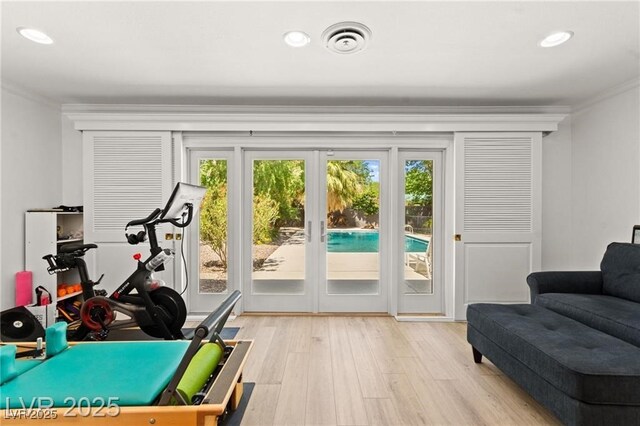 3108 Sonia Dr, Las Vegas, NV 89107 - exercise area with ornamental molding, plenty of natural light, french doors, light wood-type flooring, and recessed lighting