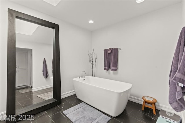 3108 Sonia Dr, Las Vegas, NV 89107 - bathroom featuring a freestanding tub and recessed lighting