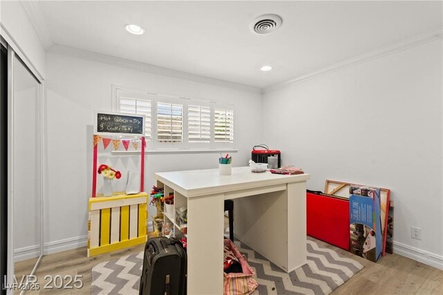 3108 Sonia Dr, Las Vegas, NV 89107 - recreation room with wood finished floors, crown molding, and recessed lighting