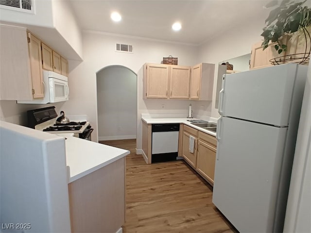 9000 Las Vegas Blvd Unit 1037, Las Vegas, NV 89123 - kitchen with white appliances, light brown cabinetry, recessed lighting, light countertops, and light wood finished floors