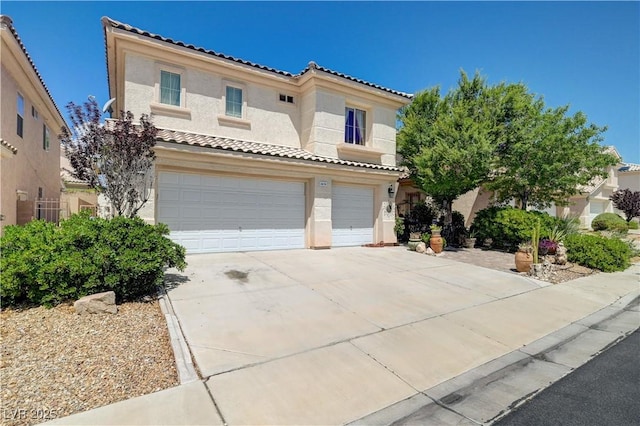 3873 Palm Island Ct, Las Vegas, NV 89147 - mediterranean / spanish house with a tiled roof, a garage, stucco siding, and driveway