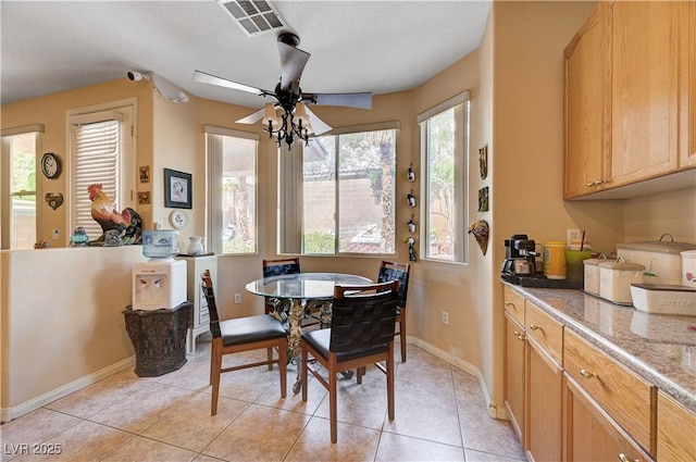 3873 Palm Island Ct, Las Vegas, NV 89147 - dining area featuring ceiling fan and light tile patterned floors