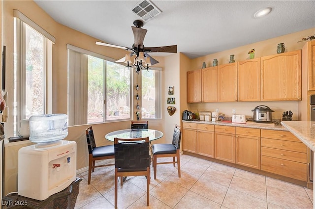 3873 Palm Island Ct, Las Vegas, NV 89147 - dining room with a ceiling fan and light tile patterned floors