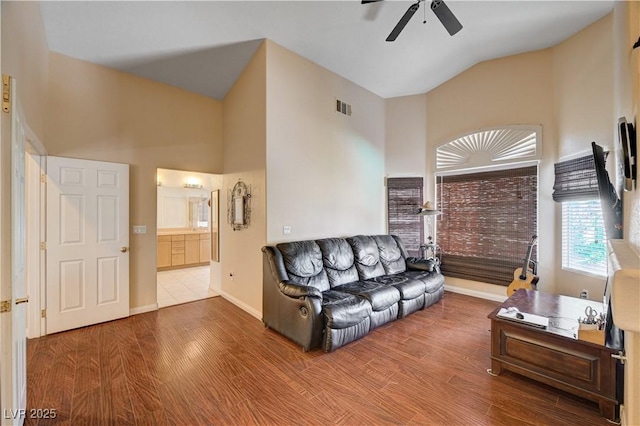 3873 Palm Island Ct, Las Vegas, NV 89147 - living room featuring a ceiling fan, wood finished floors, and high vaulted ceiling
