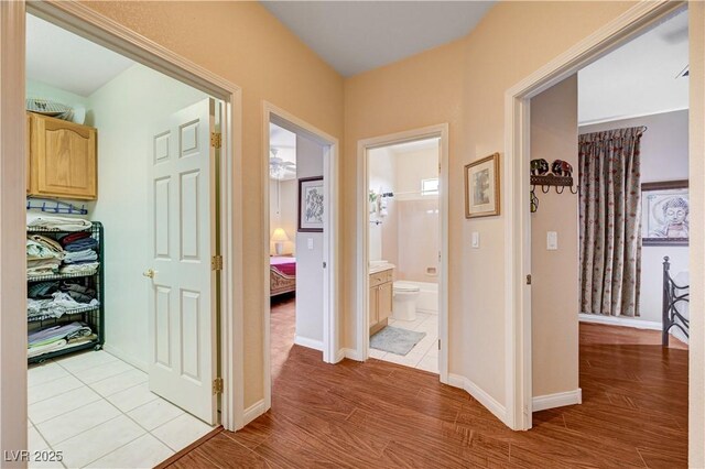 3873 Palm Island Ct, Las Vegas, NV 89147 - hall featuring light wood-style flooring and baseboards