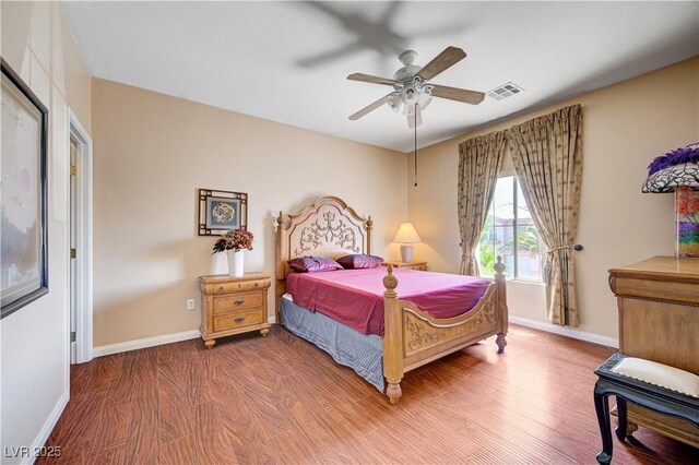 3873 Palm Island Ct, Las Vegas, NV 89147 - bedroom with wood finished floors and ceiling fan