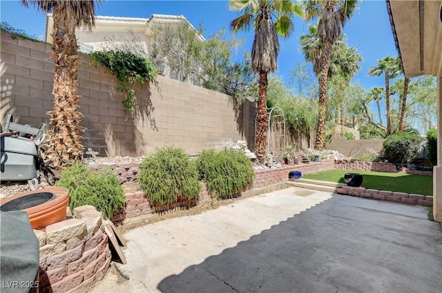 3873 Palm Island Ct, Las Vegas, NV 89147 - fenced backyard featuring a patio