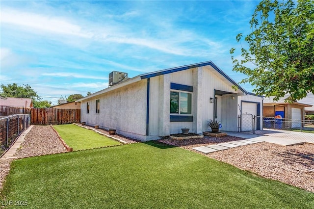 4432 Ash Ave, Las Vegas, NV 89110 - view of front of house featuring a garage, a gate, and a fenced backyard