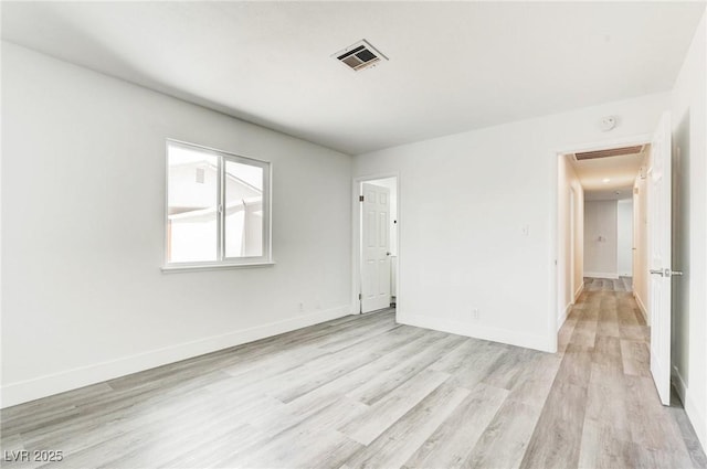 4432 Ash Ave, Las Vegas, NV 89110 - empty room featuring light wood-type flooring and baseboards