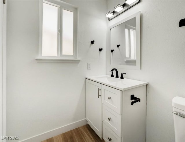 4432 Ash Ave, Las Vegas, NV 89110 - bathroom featuring vanity and wood finished floors