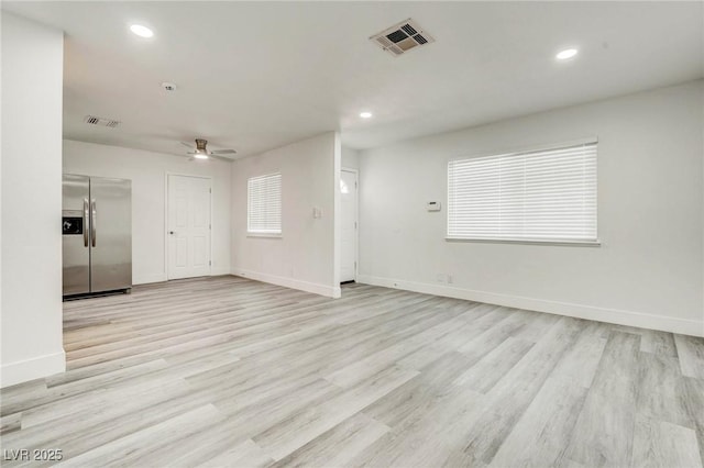 4432 Ash Ave, Las Vegas, NV 89110 - unfurnished living room with a ceiling fan, light wood-style flooring, and recessed lighting