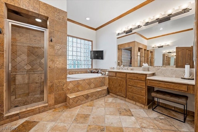 10674 Chillingham Dr, Las Vegas, NV 89183 - bathroom featuring ornamental molding, a garden tub, a shower stall, vanity, and stone tile floors