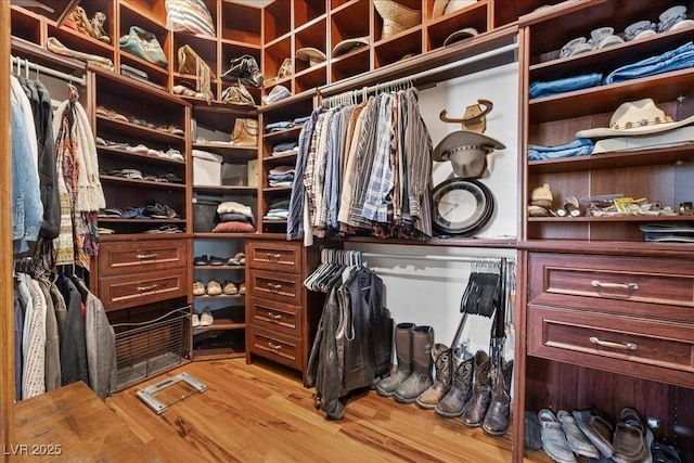 10674 Chillingham Dr, Las Vegas, NV 89183 - spacious closet with wood finished floors