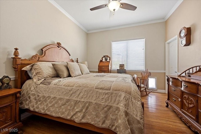 10674 Chillingham Dr, Las Vegas, NV 89183 - bedroom featuring crown molding, wood finished floors, and a ceiling fan