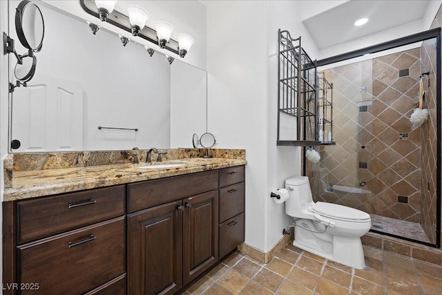 10674 Chillingham Dr, Las Vegas, NV 89183 - full bathroom featuring vanity, a shower stall, and stone tile flooring
