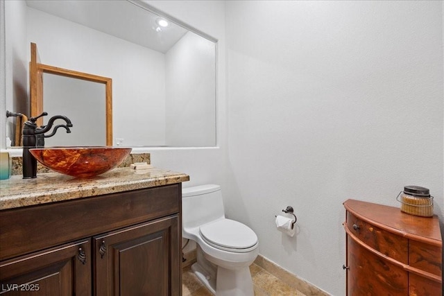 10674 Chillingham Dr, Las Vegas, NV 89183 - bathroom with baseboards and vanity