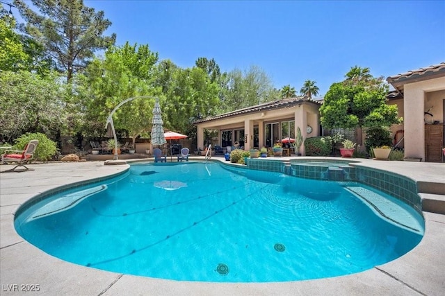 10674 Chillingham Dr, Las Vegas, NV 89183 - view of pool featuring a pool with connected hot tub and a patio area
