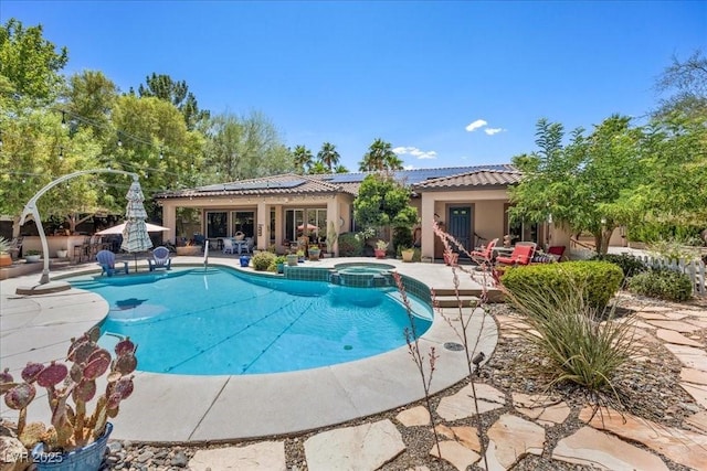 10674 Chillingham Dr, Las Vegas, NV 89183 - view of swimming pool with a patio and a pool with connected hot tub