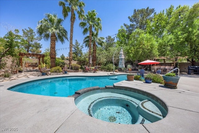10674 Chillingham Dr, Las Vegas, NV 89183 - view of swimming pool featuring a patio and a pool with connected hot tub