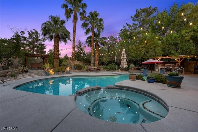 10674 Chillingham Dr, Las Vegas, NV 89183 - view of pool with a pool with connected hot tub, a patio, and a pergola