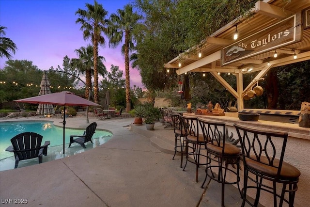10674 Chillingham Dr, Las Vegas, NV 89183 - swimming pool featuring a patio