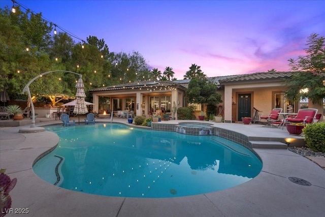 10674 Chillingham Dr, Las Vegas, NV 89183 - view of pool with a patio area and a pool with connected hot tub