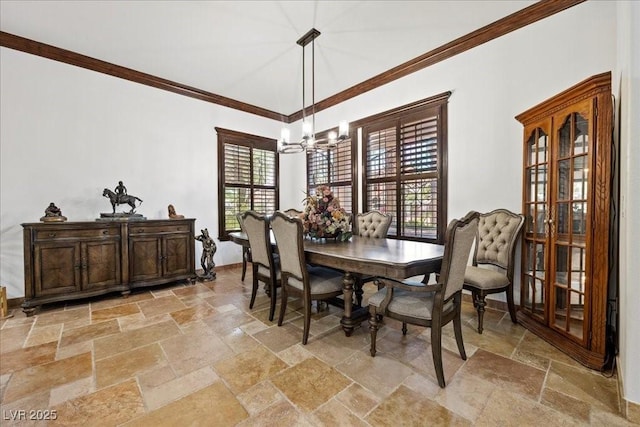 10674 Chillingham Dr, Las Vegas, NV 89183 - dining room with stone tile floors, a chandelier, and crown molding