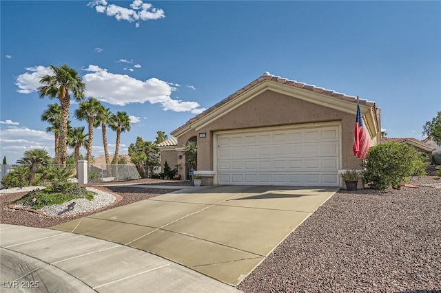2401 Ocean Edge Ct, Las Vegas, NV 89134 - ranch-style house featuring stucco siding, driveway, a tiled roof, and a garage