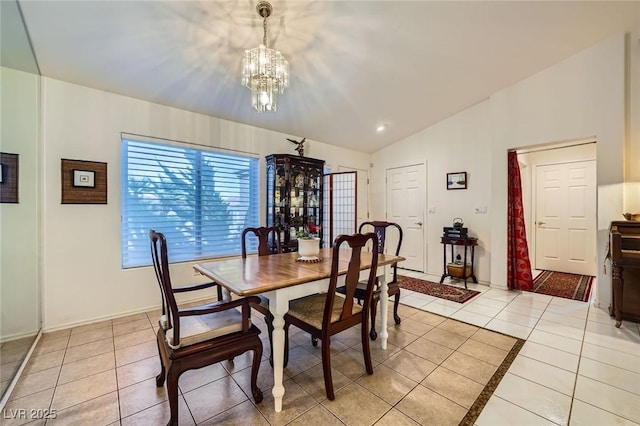 2401 Ocean Edge Ct, Las Vegas, NV 89134 - dining room featuring light tile patterned flooring, a chandelier, and lofted ceiling