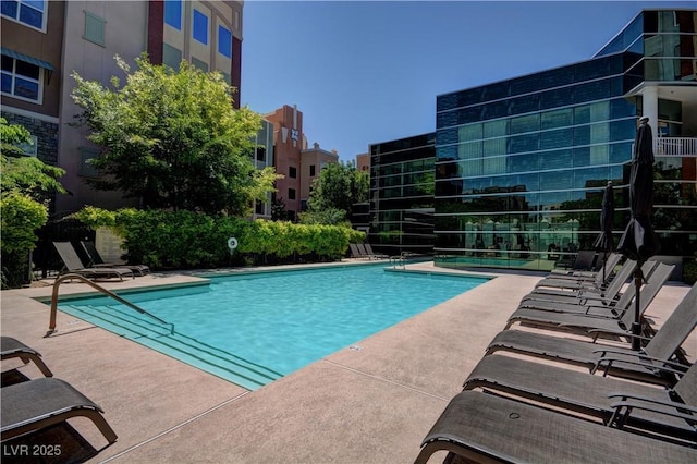 32 E Serene Ave Unit 207, Las Vegas, NV 89123 - community pool with a patio area