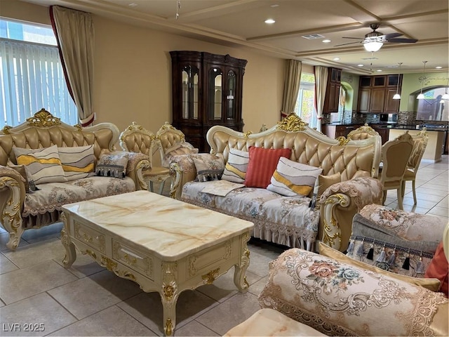6277 Mustang Spring Ave, Las Vegas, NV 89139 - living room featuring healthy amount of natural light, recessed lighting, light tile patterned floors, ceiling fan, and beamed ceiling