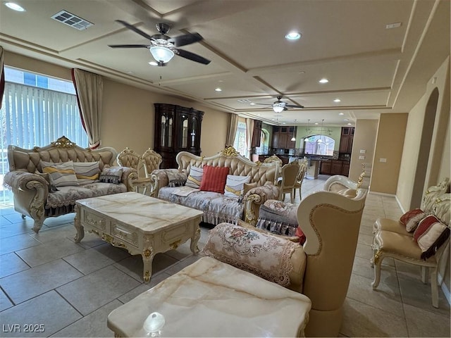 6277 Mustang Spring Ave, Las Vegas, NV 89139 - living area featuring a ceiling fan, coffered ceiling, healthy amount of natural light, recessed lighting, and light tile patterned floors