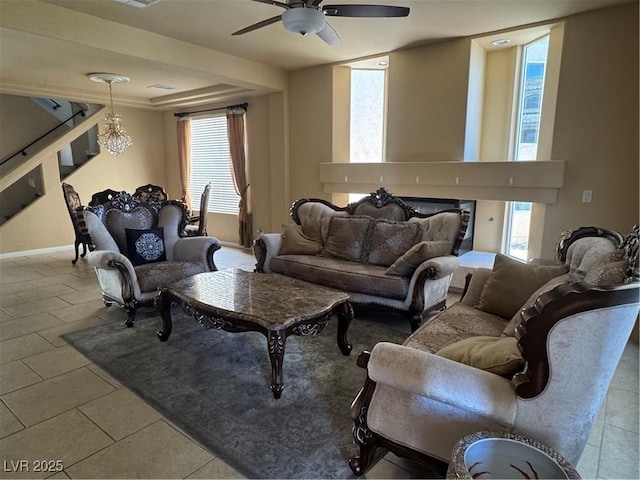 6277 Mustang Spring Ave, Las Vegas, NV 89139 - living room with ceiling fan, healthy amount of natural light, and tile patterned flooring