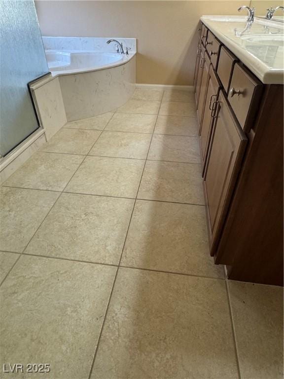6277 Mustang Spring Ave, Las Vegas, NV 89139 - full bathroom with tile patterned floors, a garden tub, double vanity, and an enclosed shower