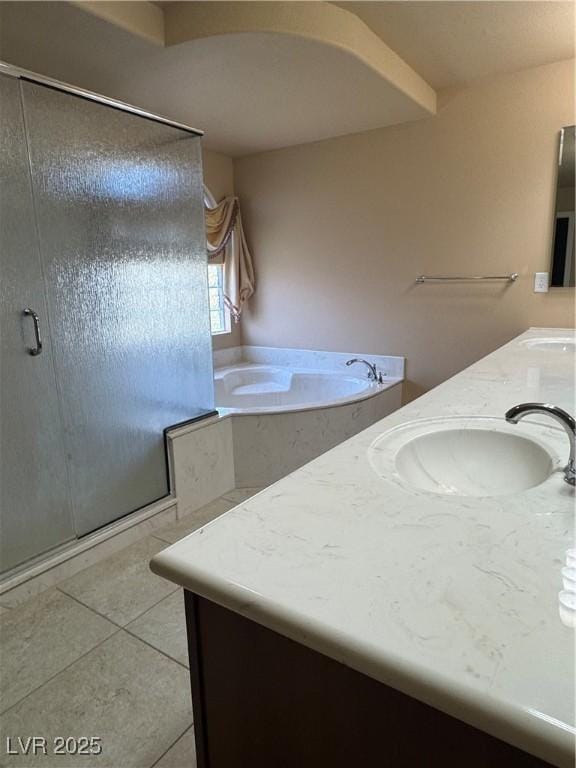 6277 Mustang Spring Ave, Las Vegas, NV 89139 - full bathroom with double vanity, a bath, tile patterned flooring, and a stall shower
