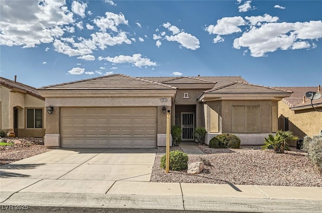 1816 Eagle Mesa Ave, Henderson, NV 89012 - prairie-style home with an attached garage, driveway, and stucco siding
