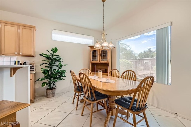 1816 Eagle Mesa Ave, Henderson, NV 89012 - dining room with a chandelier and light tile patterned flooring