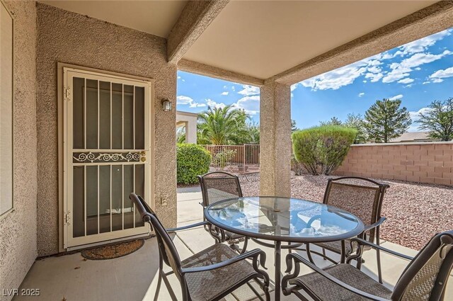 1816 Eagle Mesa Ave, Henderson, NV 89012 - fenced backyard with outdoor dining space and a patio